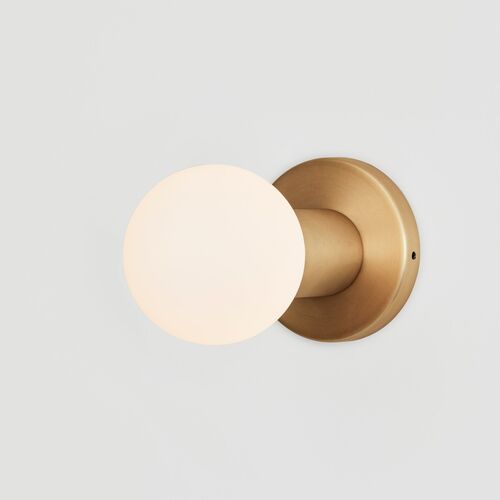 Lochan Wall Light in Brass + Sphere III – Tala North America