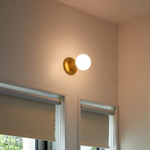 Lochan Wall Light in Brass + Sphere III – Tala North America