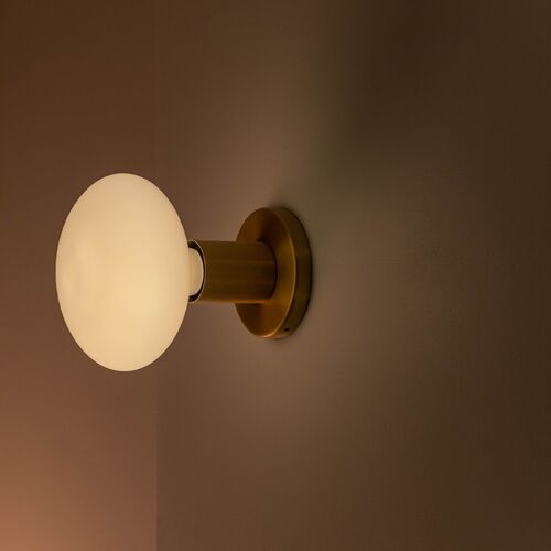 lochan-brass-oval-on-grey-background-2048×2048